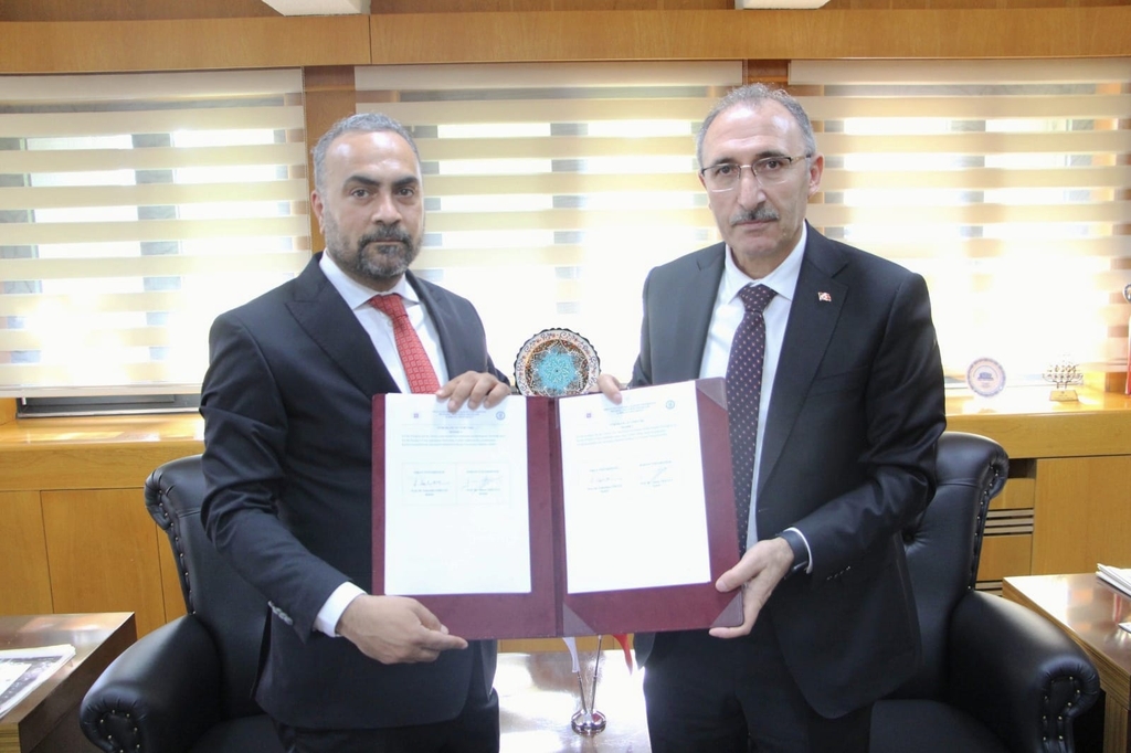 Cooperation protocol signed between BARÜ and Fırat University Kapak
